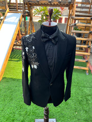 Elegant black peak lapel with hand work by zuber stylo