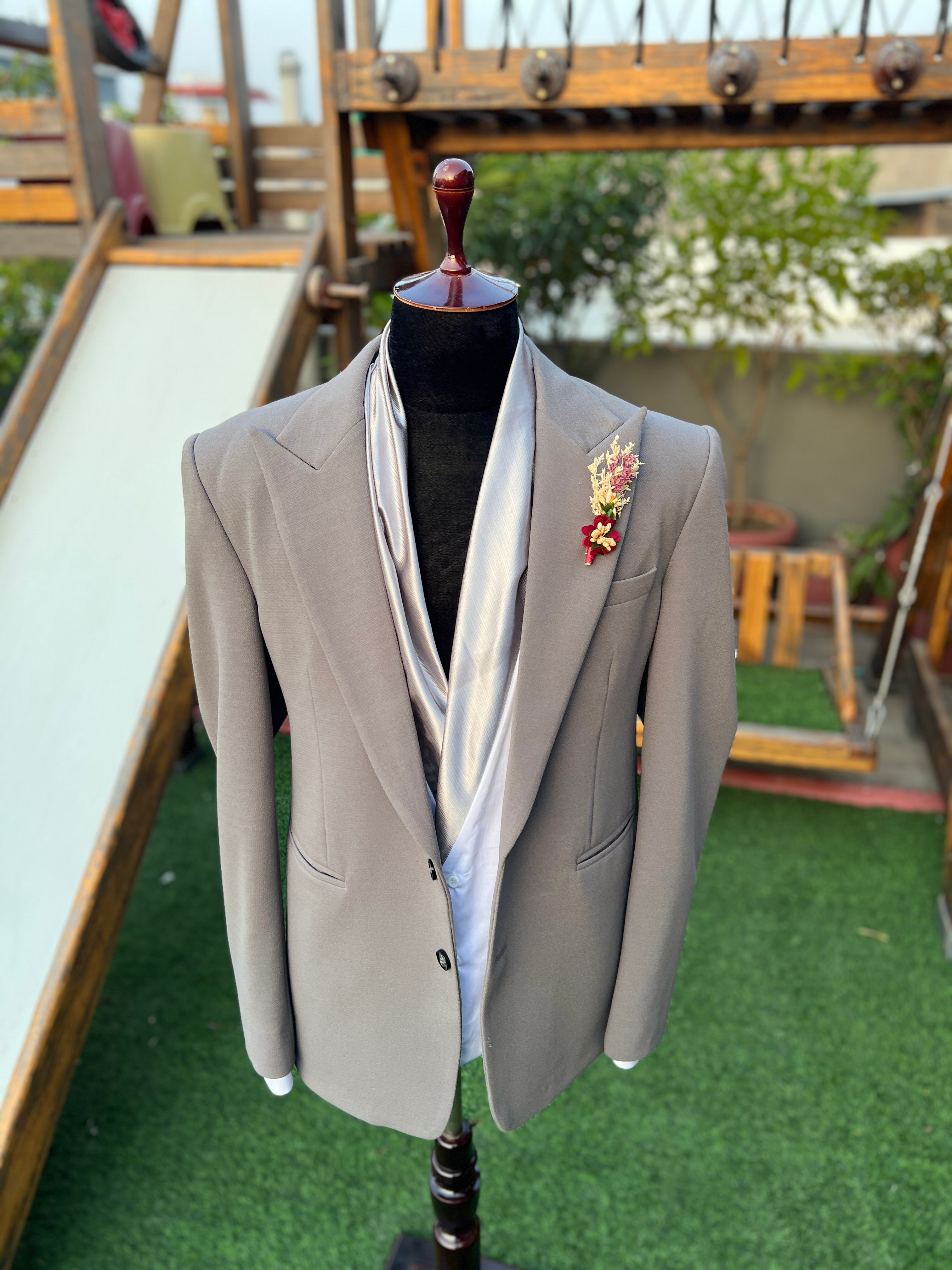 Grey suit with shall collar shirt